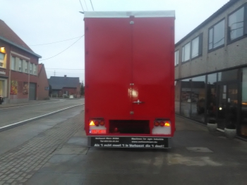 Trailer with roof and sliding curtains